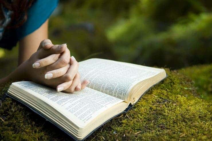 woman-praying-bible-featured-w740x493.jpg