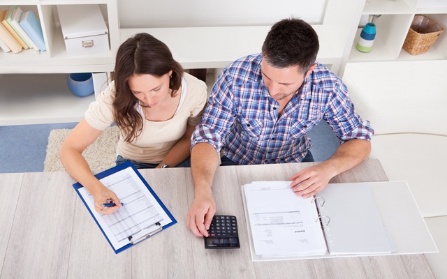 Couple Calculating Bills