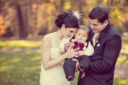 8a1bfb8a-bride-groom-baby-wedding-portrait-500x333.jpg